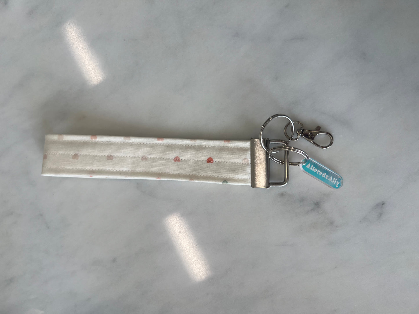 The Everyday Keychain in Candy Hearts