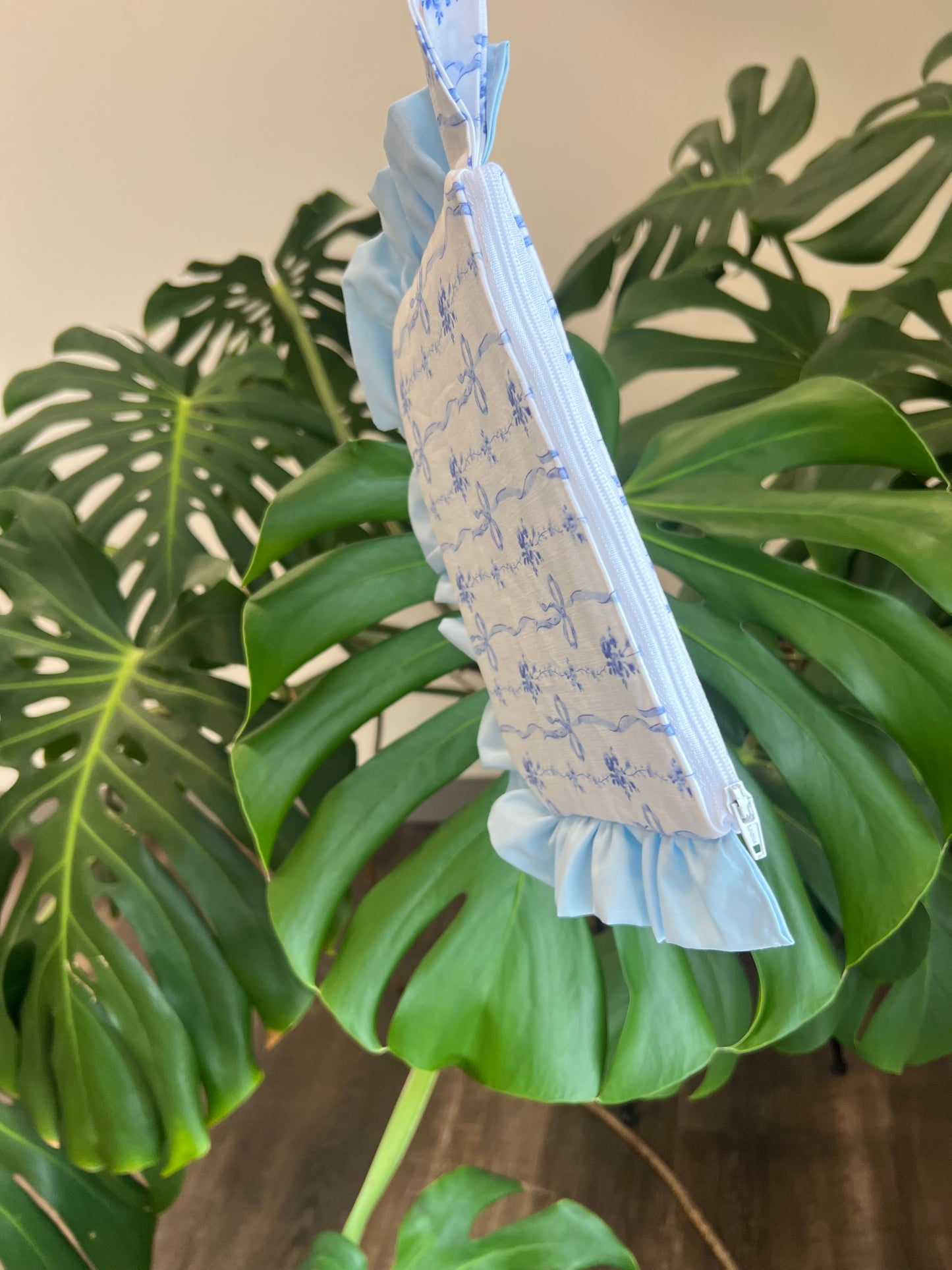 Amelia Ruffle Pouch in Blue Belle Bows